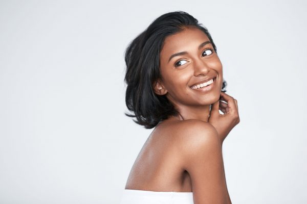 Shot of a beautiful young woman posing against a white background.